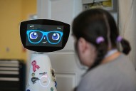 A robot programmed to act like a 7-year-old girl works to combat fear and loneliness in hospitals