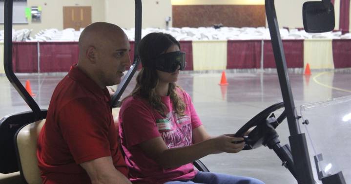High school students learn traffic safety with hands
