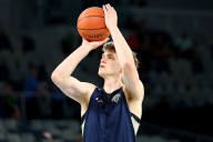 Basketball Player Suffers Fractured Vertebrae After Backboard Falls on Him