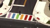 Parking spots used as colorful protest against Florida crackdown on rainbow crosswalks
