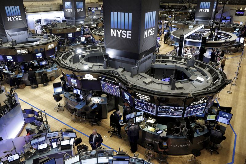 Wall Street indexes end down slightly amid slowdown concerns after jobs data