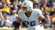Chargers left tackle Joe Alt carted off with ankle injury