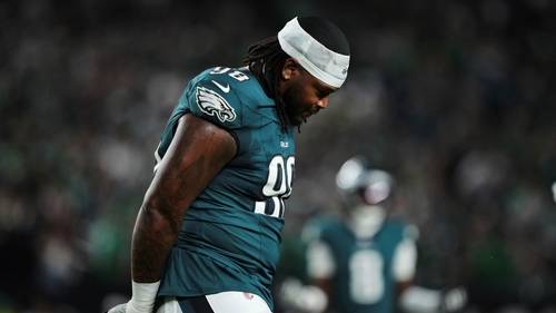 Carter apologizes following ejection for spitting on Cowboys QB