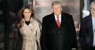 Melania and Donald Trump's rare display of affection as they land for UK visit