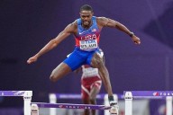 Benjamin wins 400 hurdles, is disqualified, then given worlds gold medal