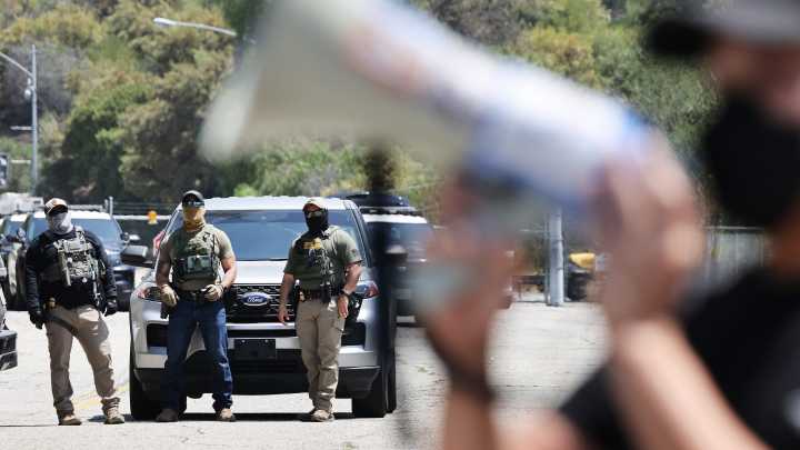 California approves ban on local and federal agents from wearing masks
