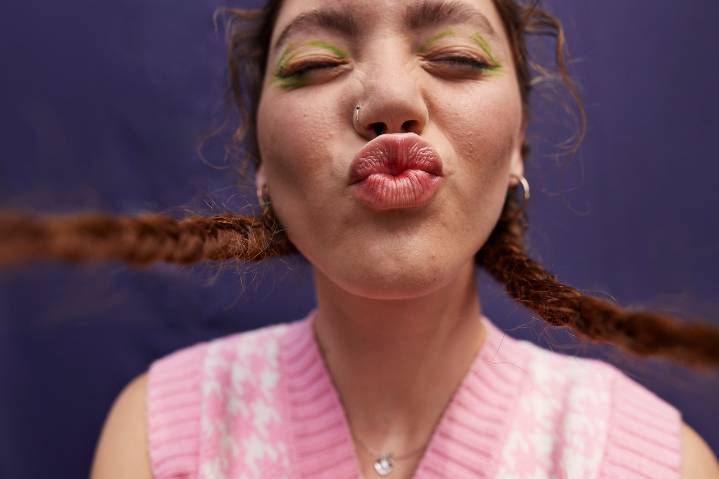Miss Manners: How can I get my friend to stop kissing me on the lips each time we meet?