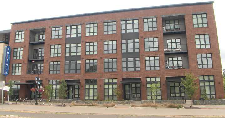 Riverfront development continues with the second residential building opening