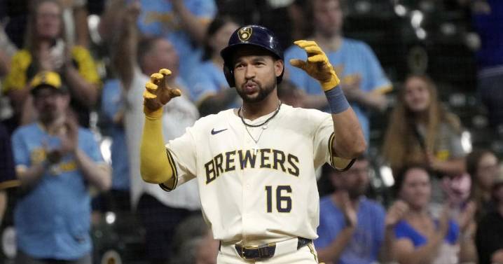 Rested Woodruff has solid start and Perkins drives in 5 to lead Brewers over Angels 9