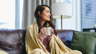 Should You Wash Throw Blankets More Often In The Fall? Here's What Pros Say