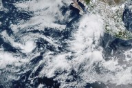 Lorena becomes a hurricane off the western coast of Mexico as Kiko travels over open waters