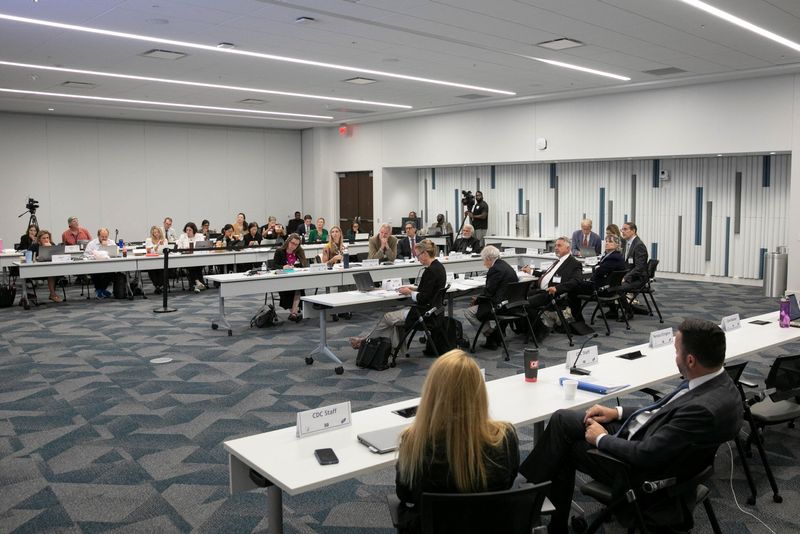 US vaccine advisers abandon broad recommendation for COVID shots