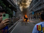 Dozens arrested and hurt in clashes in Manila
