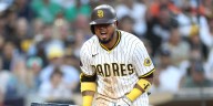 Luis Arráez does push-ups during Padres game against Orioles