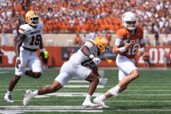 Manning runs for 2 touchdowns but struggles again in passing game as No. 7 Texas beats UTEP 27