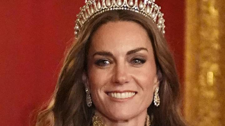 Kate Middleton's mermaid hair cascades down her back in 'behind