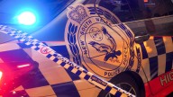 Police arrest 38-year-old woman after allegedly storming into Sydney bank with knife