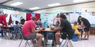 Players from Badger Football team visit Sandburg Elementary School, inspire kids to read