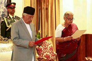 Nepal returns to calm as first woman PM takes charge