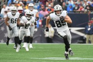 Deadspin | Raiders TE Brock Bowers 'OK' after being hit on knee