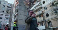 Ukraine government building damaged in Kyiv in the largest Russian attack since the war began