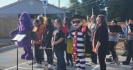 'Arch'ing Band: Science Hill's music students welcome McDonald's to community
