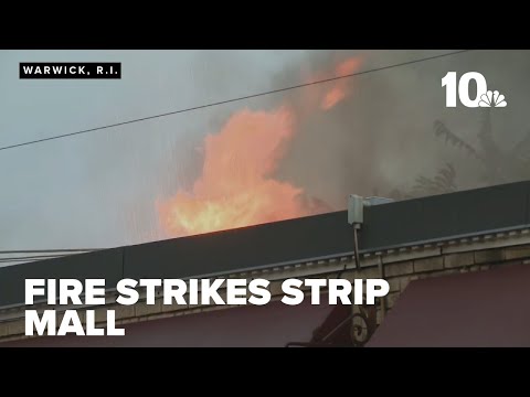 Firefighters battle flames in Warwick strip mall