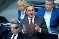 German defense minister says Russia is tracking two satellites used by the German military