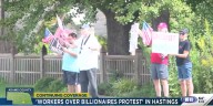 “Workers Over Billionaires” protesters line the sidewalks of Hastings