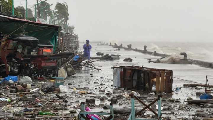 Deadly super typhoon with 137mph winds hits Philippines lashing island nation as hundreds of flights are cancelled