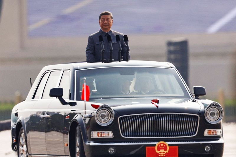 Hosting massive military parade, China's Xi says world faces war or peace