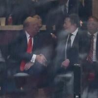 Trump and Musk sit side-by-side, months after messy split