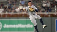 Yankees’ Aaron Boone explains starting Anthony Volpe over Jose Caballero