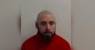 Victim arrested after trying to find Lanarkshire rapist who faked his own death slams police