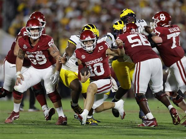 John Mateer has 2 TDs rushing, 1 passing as No. 18 Oklahoma beats No. 15 Michigan 24