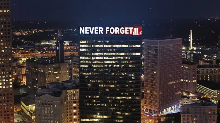 Words 'Never Forget' illuminated on Atlanta building, stadium stair climbs honor victims of 9/11