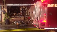 Firefighters battle fire at Tiger Eye Gift Shop in Warwick
