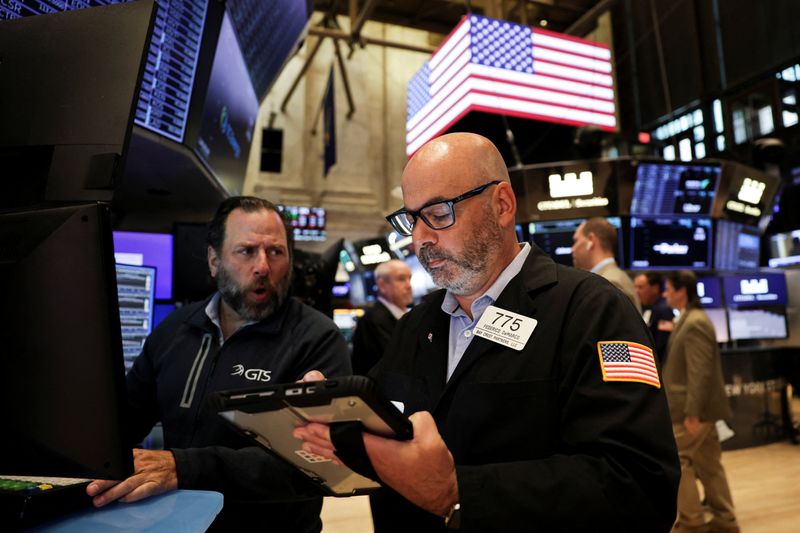 Wall Street futures hold steady after tech-fueled rally; Powell in focus