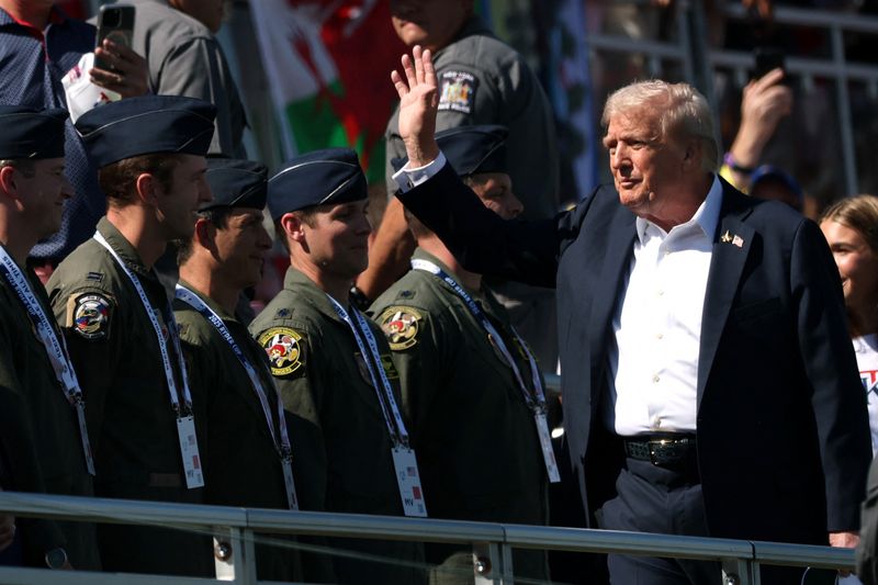 Trump arrives at Ryder Cup to cheers as home fans hope to boost US team