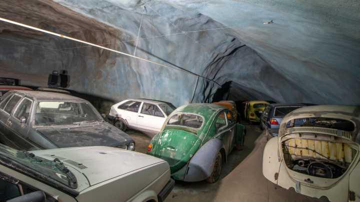 Mystery as dozens of vintage cars are found buried deep underground in derelict mine