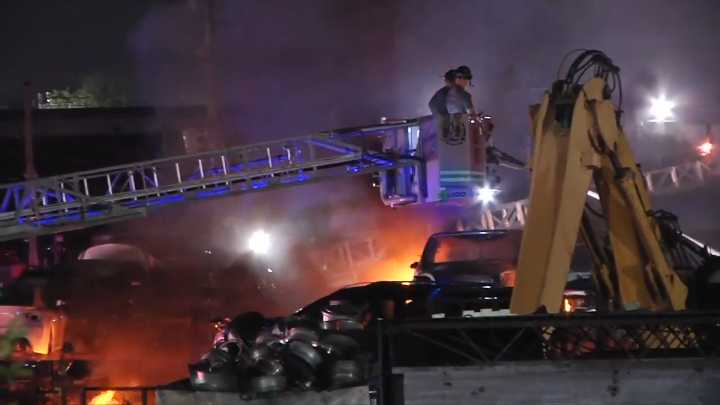 Flames erupt in Opa-locka junk yard