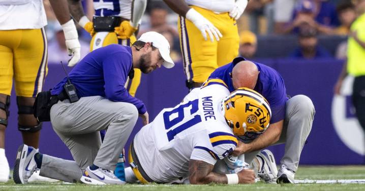 LSU starting center Braelin Moore could miss time with an ankle injury. Here's the latest.