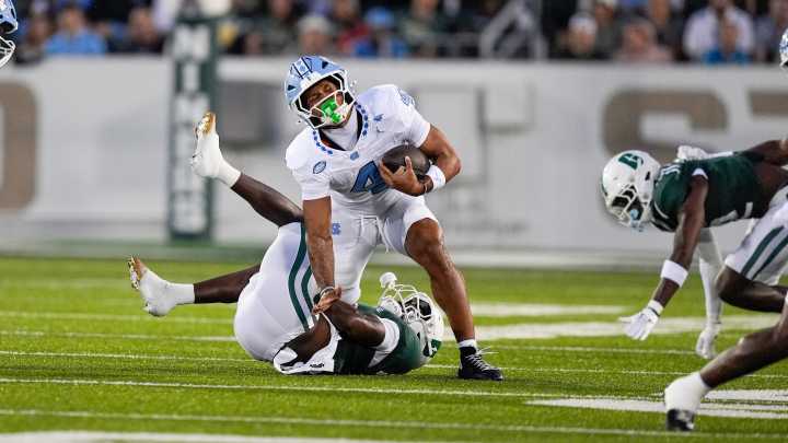 See the photos! Bill Belichick and UNC football take on Charlotte