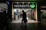 Australia's Woolworths, Coles warn of extra costs after court's wage case ruling