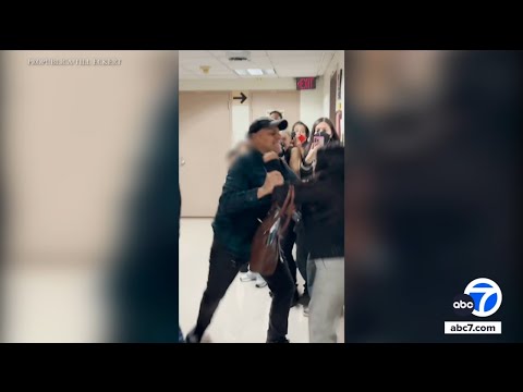 ICE officer seen pushing woman to the floor at NY immigration court relieved of duties, agency says
