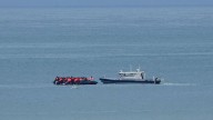 First migrants arrive in UK from France under the 'one in, one out' policy