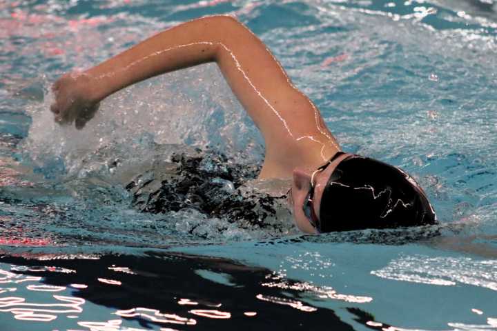 Girls Swimming and Diving: Cards take 9 of the 12 events, evening out their season record at 1