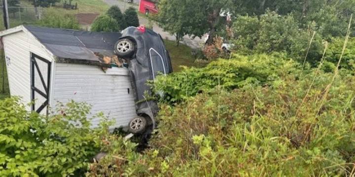 Police Hunt for Suspects After Stolen SUV Lands on Shed in Stephenville Crossing