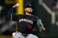 Twins fall to deGrom, Rangers