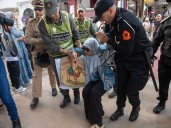 Young Moroccans clash with police while protesting